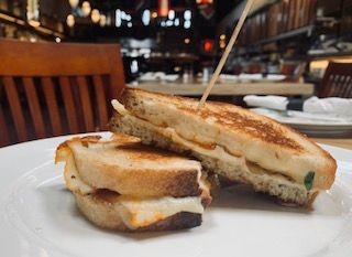 The Old Goat signature dishes Charley Apple ChickenEmily ReubenOld Goat Grilled Cheese